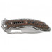 Canivete CRKT Fossil com sistema IKBS e empunhadura em G10. 